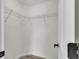 Walk-in closet with wire shelving and white walls at 904 Nw 67Th St, Ocala, FL 34474