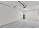 Bright garage featuring epoxy floor, water heater, and ample space for storage at 904 Nw 67Th St, Ocala, FL 34474