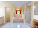Bathroom featuring a separate tub and shower, designed for relaxation and comfort at 9325 Sw 125Th Court Rd, Dunnellon, FL 34432
