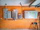 Garage featuring Enphase Energy storage system, electrical panels and utility hookups at 9325 Sw 125Th Court Rd, Dunnellon, FL 34432