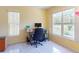 Home office with natural light features a work area with desk and window at 9325 Sw 125Th Court Rd, Dunnellon, FL 34432