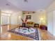 Spacious living room with a decorative rug, sofa, and recessed lighting at 9325 Sw 125Th Court Rd, Dunnellon, FL 34432