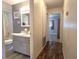Hall bathroom featuring a tub-shower combination with new vanity and a gray color palette at 9430 Sw 102Nd Pl, Ocala, FL 34481