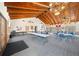 Spacious clubhouse interior with tables, chairs, and a high vaulted wood ceiling at 9430 Sw 102Nd Pl, Ocala, FL 34481