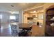 Charming eat-in kitchen featuring wood-look floors and a view of the living area at 9430 Sw 102Nd Pl, Ocala, FL 34481