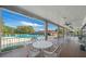 Covered patio overlooking a sparkling community pool, great for relaxation and socializing at 9430 Sw 102Nd Pl, Ocala, FL 34481