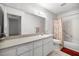 Bathroom featuring a vanity with storage, tub/shower combo, and tiled floors at 9667 Sw 94Th Ct # C, Ocala, FL 34481