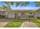 Charming single story home features a front porch, attached garage, and well maintained landscaping at 9667 Sw 94Th Ct # C, Ocala, FL 34481