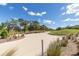View of a sand trap in the golf course, with blue skies above at 9667 Sw 94Th Ct # C, Ocala, FL 34481