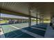 Enjoy shuffleboard on these covered courts with multiple lanes and seating, perfect for social gatherings and friendly competition at 9667 Sw 94Th Ct # C, Ocala, FL 34481