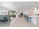 Open floor plan includes dining area and modern kitchen with natural light at 9839 Sw 90Th St, Ocala, FL 34481