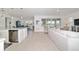 Open floor plan featuring eat in kitchen with modern appliances adjacent to bright living space at 9839 Sw 90Th St, Ocala, FL 34481