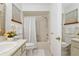 Bright bathroom with tub-shower combination and white fixtures provides a clean, functional space at 9940 Sw 101St Pl, Ocala, FL 34481