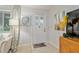 Bright and airy living room featuring stylish décor, a comfortable sofa, and plenty of natural light at 9940 Sw 101St Pl, Ocala, FL 34481
