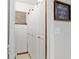 View of the pantry showcasing ample storage space with multiple cabinets and a window at 9940 Sw 101St Pl, Ocala, FL 34481