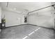 Spacious garage featuring epoxy flooring at 14540 Se 33Rd Ter, Summerfield, FL 34491