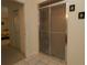Bathroom with a glass-enclosed shower and neutral tile flooring at 15324 Sw 28Th Avenue Rd, Ocala, FL 34473
