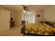 A bedroom that has double bed, dresser, window and light colored walls and carpet at 15324 Sw 28Th Avenue Rd, Ocala, FL 34473