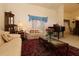 Cozy living room with comfortable seating, piano, and soft lighting creating a warm and inviting atmosphere at 15324 Sw 28Th Avenue Rd, Ocala, FL 34473