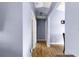 Hallway with doors and light blue accent wall at 16220 Sw 19Th Avenue Rd, Ocala, FL 34473