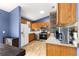 Corner kitchen featuring stainless steel appliances and wood cabinets at 16220 Sw 19Th Avenue Rd, Ocala, FL 34473