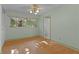 Cozy bedroom with wood-look floors, ample natural light and closet for storage at 2032 Se 12Th St, Ocala, FL 34471