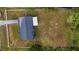 Aerial view of a property showcasing the spacious backyard and the home's layout at 2140 Ne 40Th St, Ocala, FL 34479