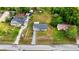 Aerial shot of a cozy home with a spacious backyard and inviting curb appeal, showcasing the property's layout at 2140 Ne 40Th St, Ocala, FL 34479