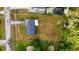 A bird's eye view reveals a well-maintained home with an expansive backyard, perfect for outdoor activities at 2140 Ne 40Th St, Ocala, FL 34479