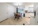 Kitchen featuring dining table and chairs near the sliding glass door to the backyard at 2140 Ne 40Th St, Ocala, FL 34479