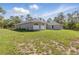 Single-story home with a beautiful green yard and ample natural light at 22189 Sw Neptune Blvd, Dunnellon, FL 34431