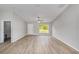 Open living area showcasing new flooring, fresh paint, and abundant natural light at 25 Juniper Pass Way, Ocala, FL 34480