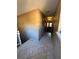 Long hallway featuring tile flooring, neutral walls, and convenient closet space at 2701 Ne 10Th St # 403, Ocala, FL 34470