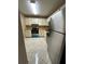 Functional kitchen featuring stainless steel appliances, tile flooring, and light countertops at 2701 Ne 10Th St # 403, Ocala, FL 34470