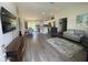 Open-concept living area seamlessly connects the kitchen, dining, and seating spaces at 3338 Sw 165Th Loop, Ocala, FL 34473