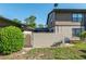 This property features a private backyard with a gated wall and lush green grass at 3815 Ne 17Th Street Cir, Ocala, FL 34470