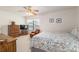Bright bedroom with large windows and ceiling fan at 3815 Ne 17Th Street Cir, Ocala, FL 34470
