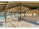 A wooden pavilion offers shaded seating and a kitchen area for residents at 3815 Ne 17Th Street Cir, Ocala, FL 34470