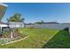 Well-maintained backyard with shed, swing and flower garden at 4064 Sw 132Nd Ln, Ocala, FL 34473