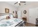 The bedroom features a ceiling fan and two doorways leading to other rooms at 4064 Sw 132Nd Ln, Ocala, FL 34473