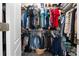 Walk-in closet featuring ample hanging space, shelves, and a basket on the floor at 4064 Sw 132Nd Ln, Ocala, FL 34473