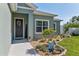 Charming entry adorned with a 'Welcome' sign and decorative wreath at 4064 Sw 132Nd Ln, Ocala, FL 34473