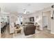 Bright living room with comfortable seating and access to the patio at 4064 Sw 132Nd Ln, Ocala, FL 34473