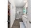 Modern bathroom features a large walk-in shower, granite countertop vanity, and ample space at 4064 Sw 132Nd Ln, Ocala, FL 34473