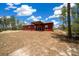 View of the new home showing back of the property and wooded surroundings at 4312 Sw 172Nd Place Rd, Ocala, FL 34473