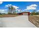 View of the front of the new home, concrete driveway, garage, and landscaping in progress at 4312 Sw 172Nd Place Rd, Ocala, FL 34473