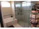 Modern bathroom with a glass-enclosed shower, soaking tub, and stylish tile accents at 4770 Sw 114Th St, Ocala, FL 34476