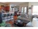 Open-concept living room with a breakfast bar, seamlessly connecting to the kitchen and dining areas at 4770 Sw 114Th St, Ocala, FL 34476