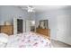 Cozy bedroom with ceiling fan, carpeted floors, and neutral walls at 4927 Sw 45Th Cir, Ocala, FL 34474