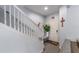 Welcoming entry foyer features a staircase, decorative accents, and seamless transition to the main living areas at 4927 Sw 45Th Cir, Ocala, FL 34474
